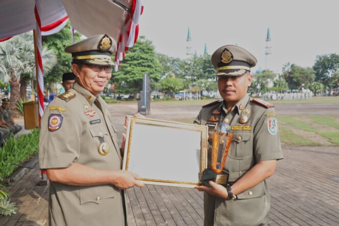 
					Sabet Juara I Tingkat Jatim,Satpol- PP Tuban Raih Trofi dan Piagam.