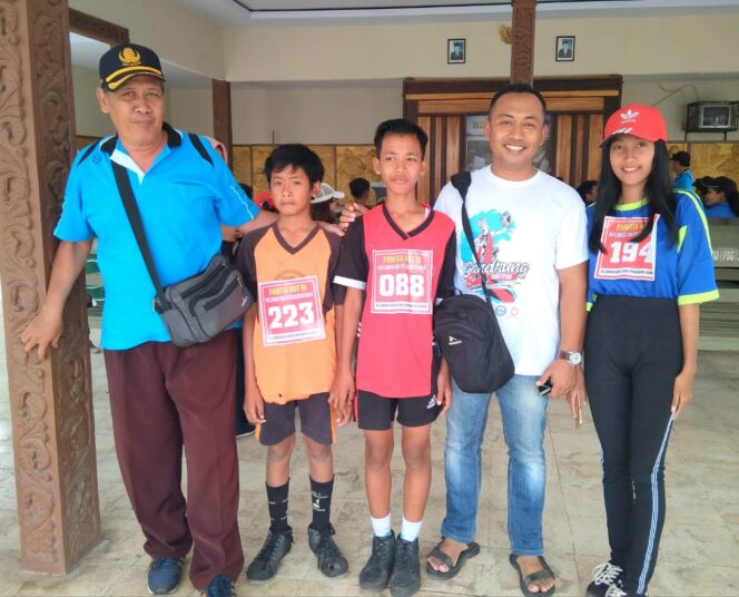 
					Memeriahkan HUT RI ke 74 Desa Pesanggaran Gelar Lomba Lari Jauh