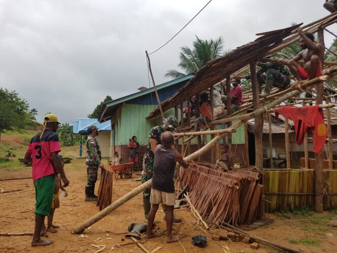 
					Karya Bakti di Perbatasan, Yonif 516/CY Bangun rumah Adat